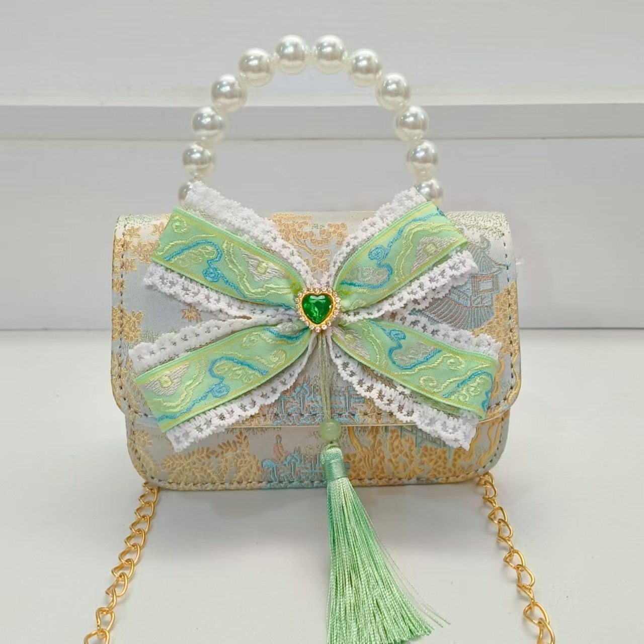 Guofeng arco princesa bolso de perla bolso de hombro bolso de cambio bolso pequeño bolso cuadrado bolso accesorios de ropa de niñas