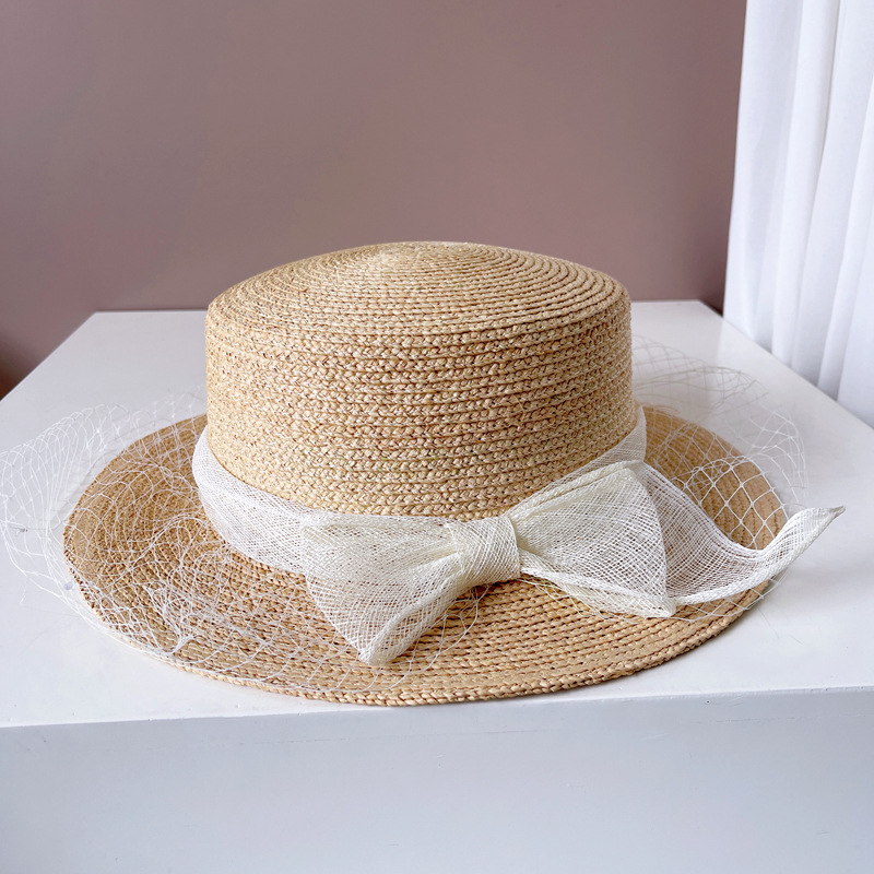 Cappello di paglia donna elegante hepburn in rafia con fiocco_voghion.com