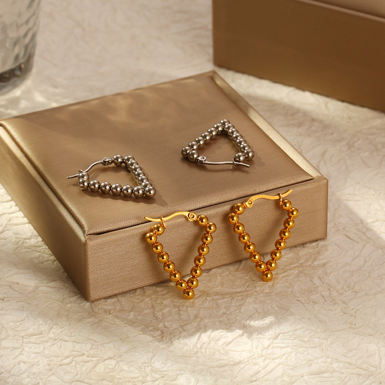 Pendientes triangulares de acero inoxidable de alta gama estilo francés, con diseño exclusivo, modernos pendientes chapados en oro de 18 quilates.