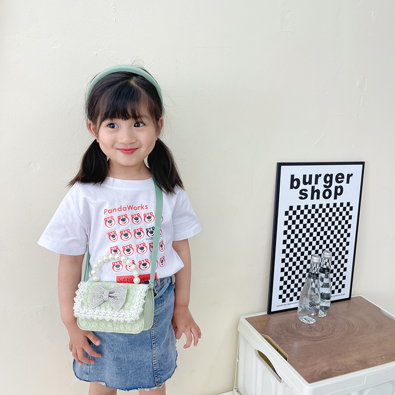 Bolsa de Niños de estilo coreano lindo arco perla Bolso pequeño princesa estilo occidental desgaste a juego joyería bolsa crossbody bolsa