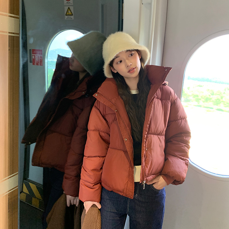 Corea de la nueva moda corta de algodón mujer 2025 invierno nuevo hombre pequeño suelto chaqueta de pan con capuzas image 3
