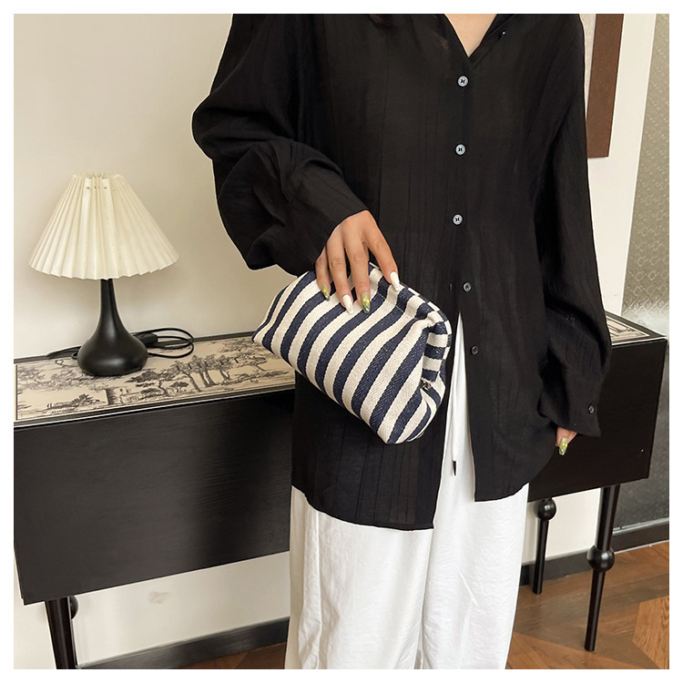 New cross-border fashion color-blocking striped cosmetic bag, women's loose change mobile phone storage bag, trendy and niche cloud clutch undefined