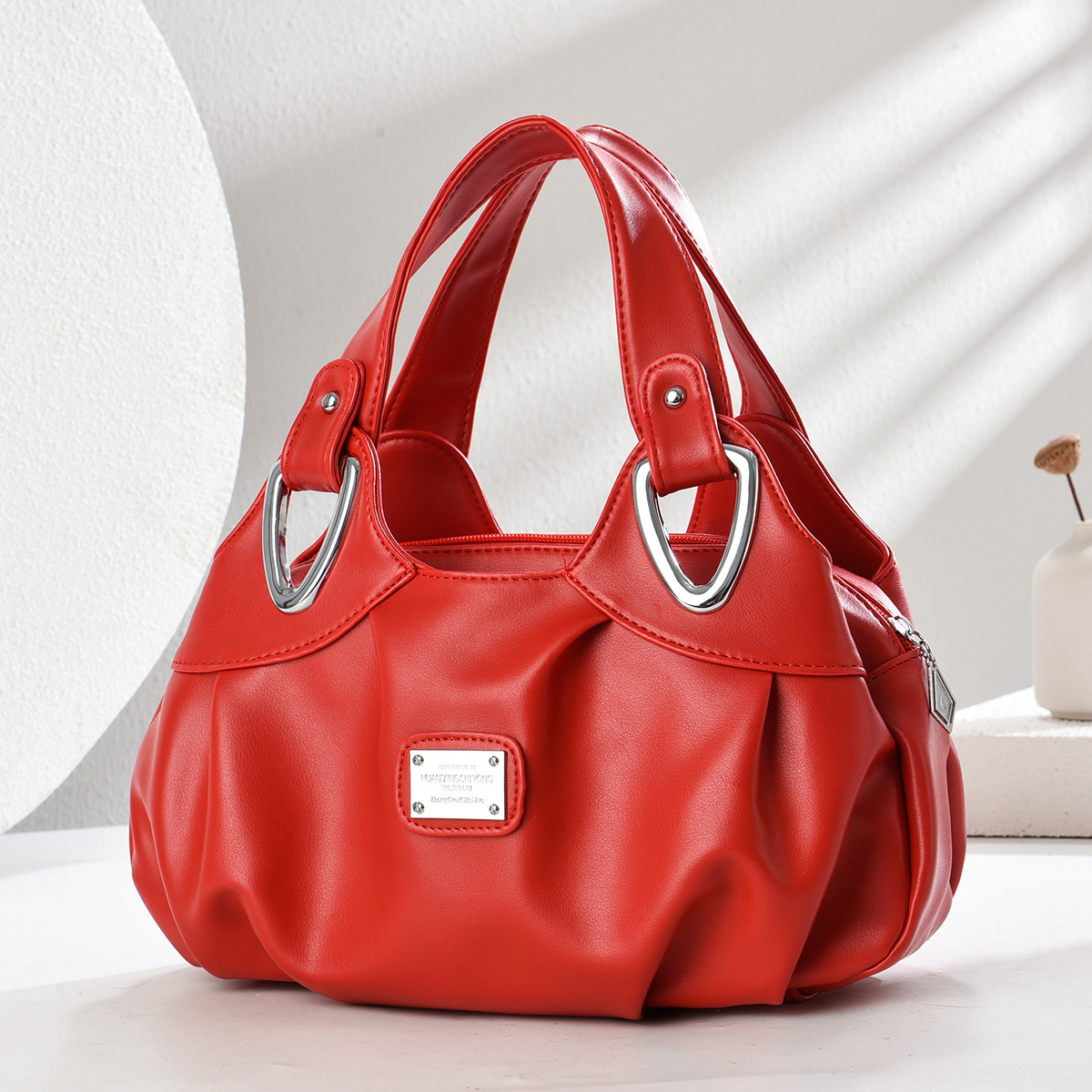 2025 nuevo estilo de moda de madres de mediana edad bolso de mano temperamento bolso de madre bolso de hombro de moda europea y americana