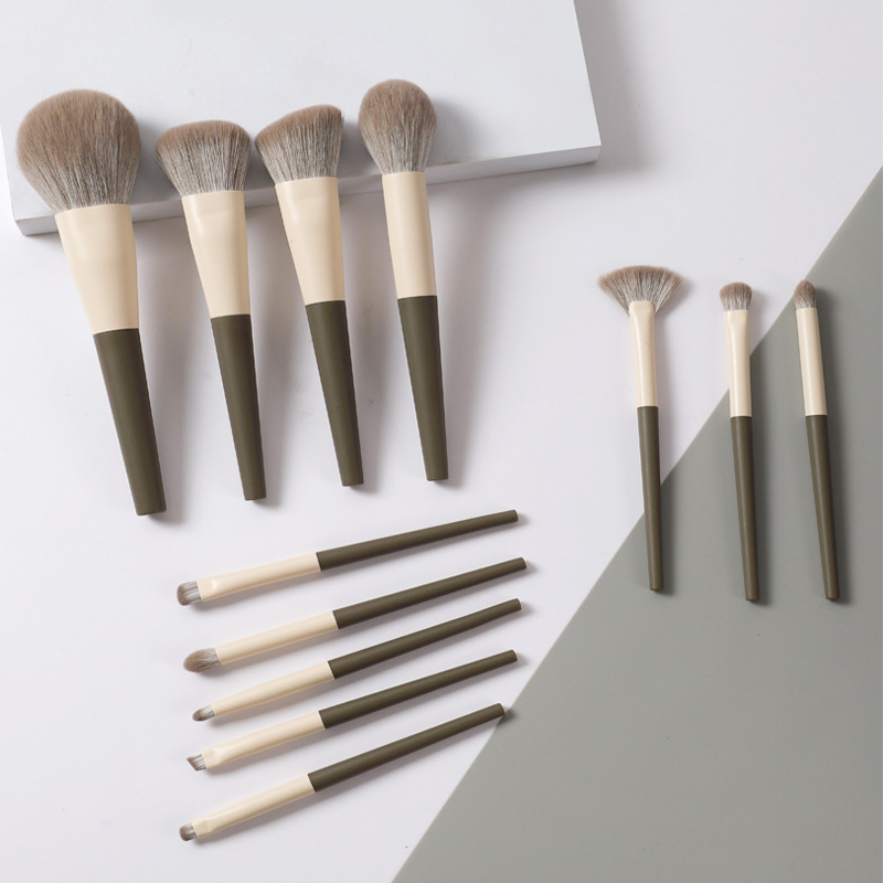 12 principiantes Cangzhou conjunto de cepillo de maquillaje de tinta a granel conjunto completo de cepillo de sombra de ojos herramientas de maquillaje blush cepillo