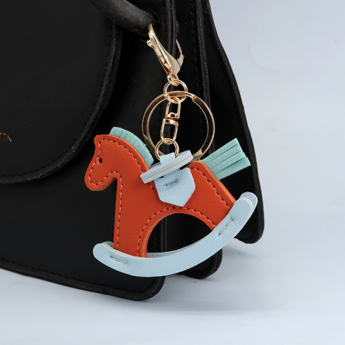 Best selling leather rocking horse key chain accessories pony pendant bag pendant cartoon small wooden horse key chain