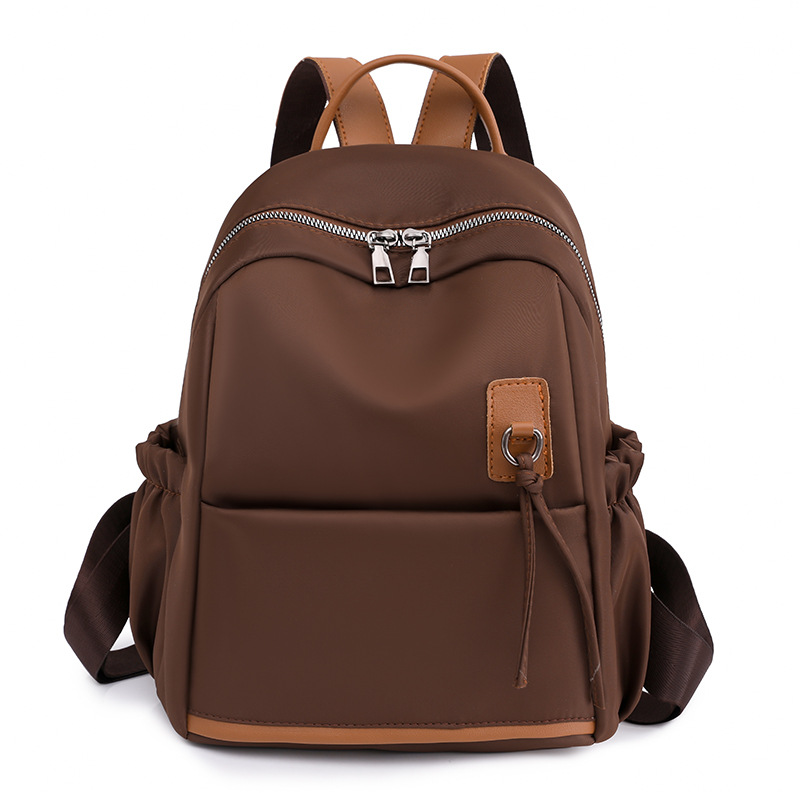 Spot al por mayor 2023 nuevo estilo casual damas Oxford mochila moda simple arte viajes mochila marea