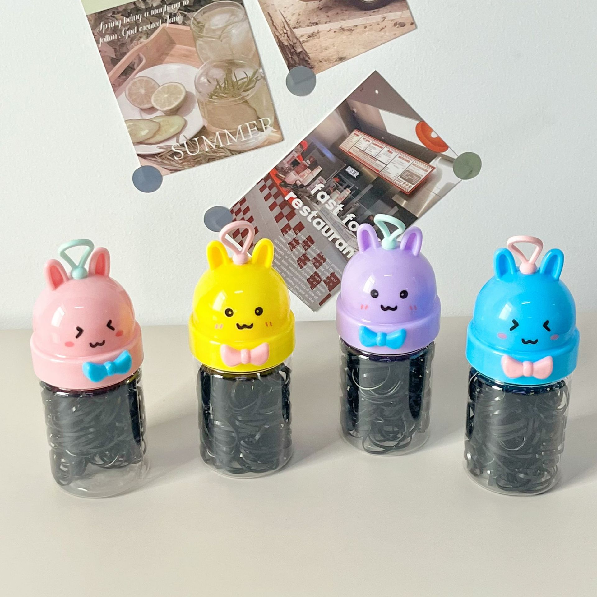 Yiwu al por mayor dibujos animados enlatados cabeza de cuerda de goma desechable negro colorido para niños no lastimar anillo de pelo cinta de goma encantadora