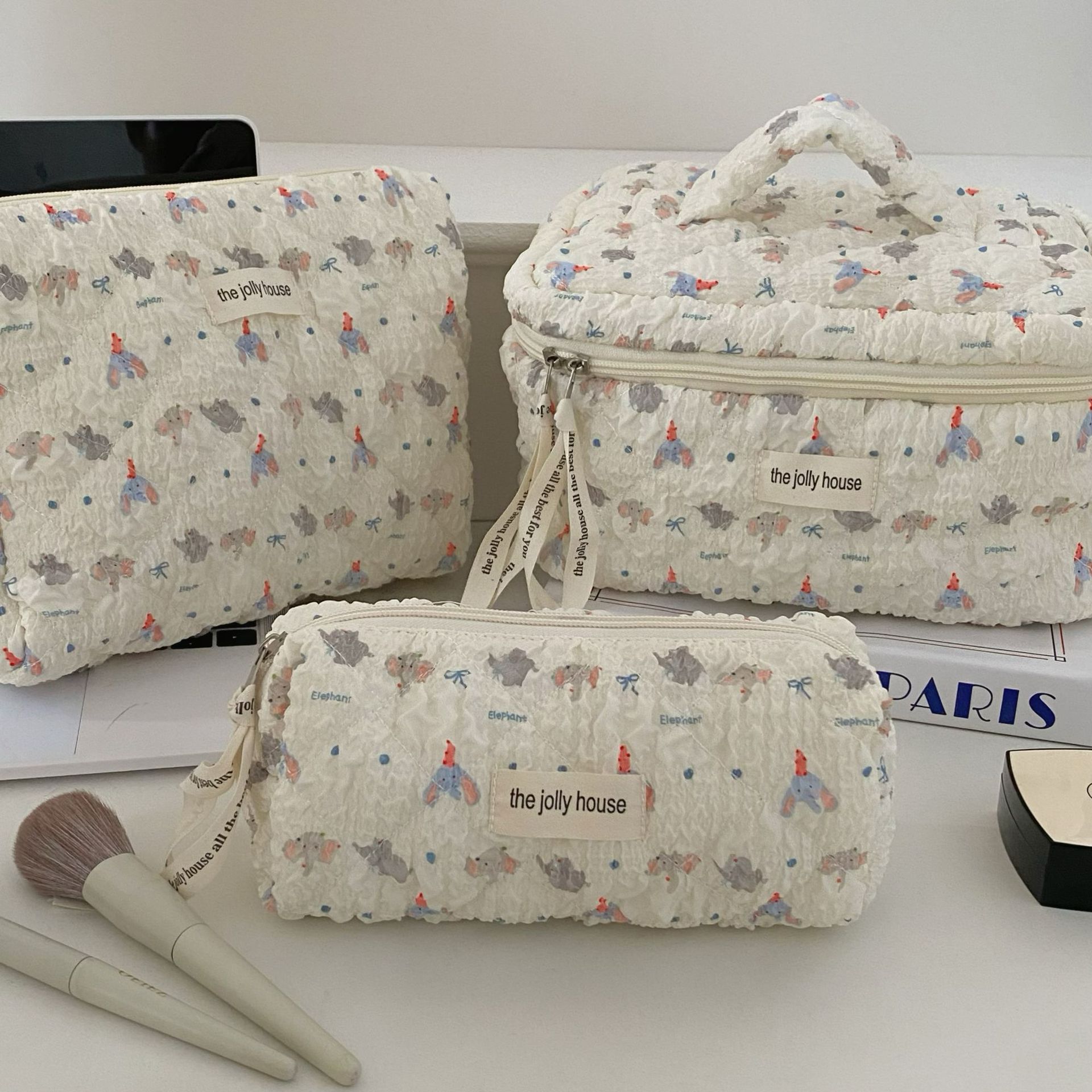 Versión coreana de la bolsa de cosméticos con lazo simple, bolsa de lavado de viaje portátil de gran capacidad, bolsa de almacenamiento de cosméticos para niñas