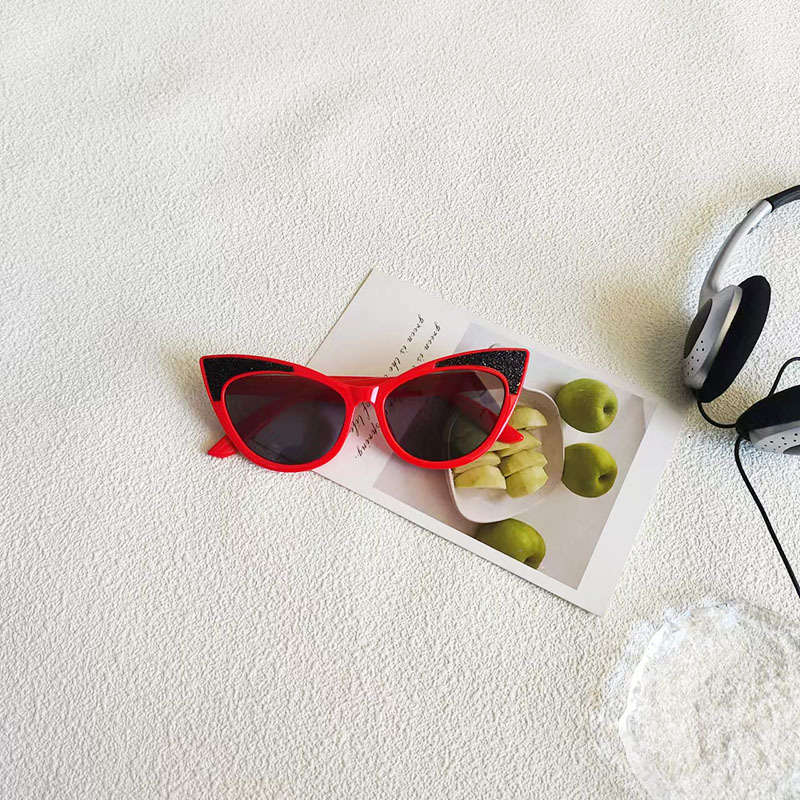 Moda ojo de gato parpadeante personalidad gafas de sol para niños Europa y América transfronterizas gafas de sol para niños al aire libre gafas de sol