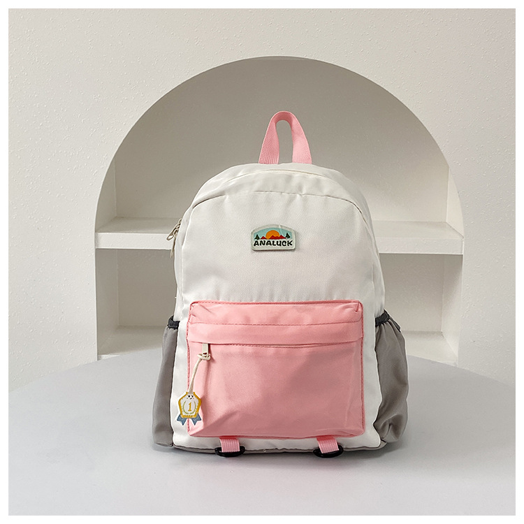 2025 mochila de moda coreana para niños y niñas, mochila para niños de jardín de infantes, nueva mochila para niños de color exterior