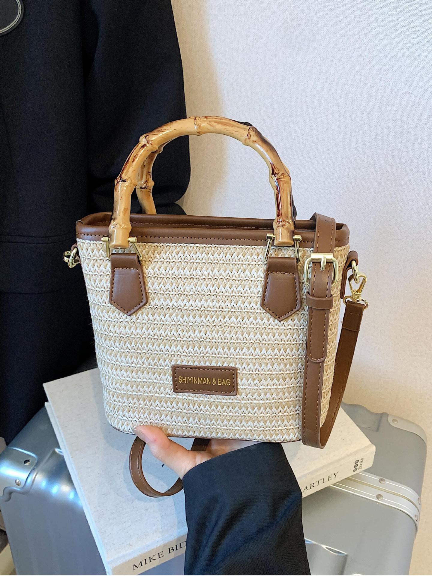 Bolsa de tejido de verano super caliente para mujeres 2025 nuevo juego de playa portátil bolso de balde arco iris tela de paja bolso de mochila para mujeres