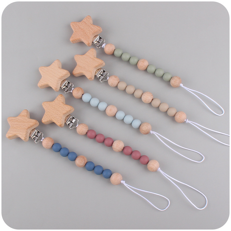 Nuevos juguetes infantiles de beech campana diente calmar bebé beech Júpiter clips cadena de tetas de silicona dos piezas conjunto