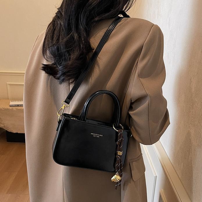 Transfronterizo simple bolso de mano ocio para mujeres 2025 nuevo bolso de hombro de moda retro popular bolso de mochila versátil