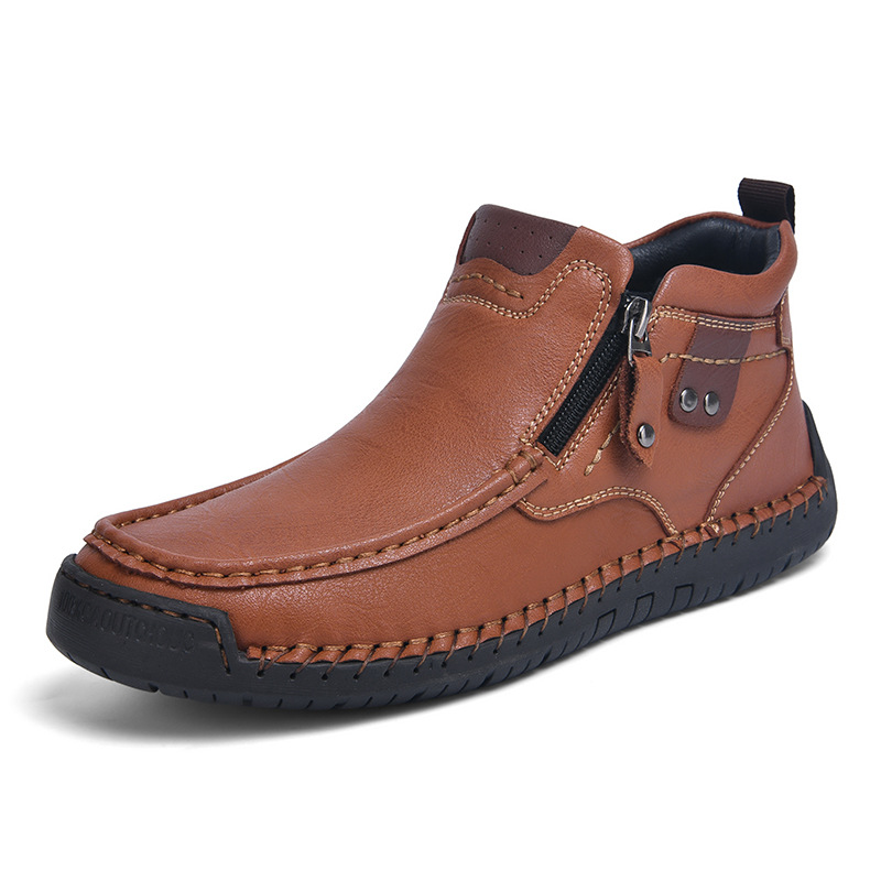 Nuevos zapatos casuales de hombre con cremallera lateral, botas cortas de moda, zapatos al aire libre de tamaño grande, invierno de comercio exterior transfronterizo 2025.