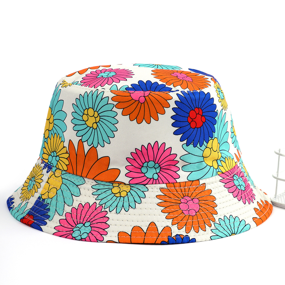 Nuevo sombrero adulto de protección solar casual al aire libre de doble cara de camuflaje sombrero de pescador hembra impresa Daisy sombrero para el sol