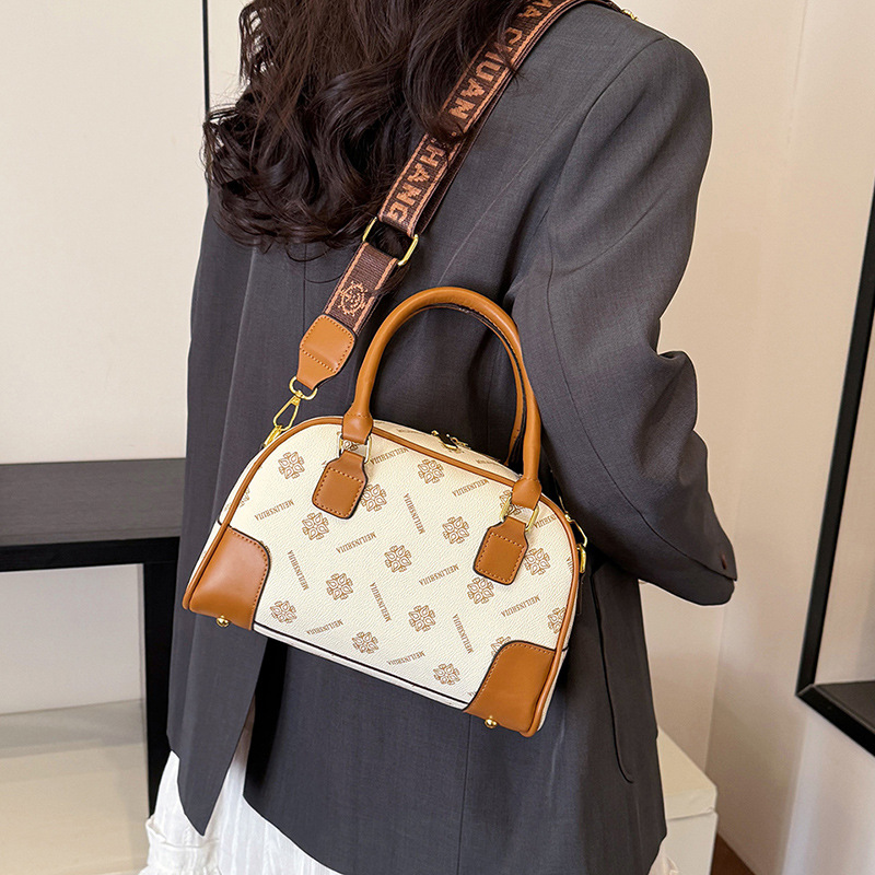 Bolso de mujer impresa retro bolso de mano bolso de mujer bolso de mujer 2025 nuevo bolso de madre doble capacidad de moda bolso de tramo inclinado