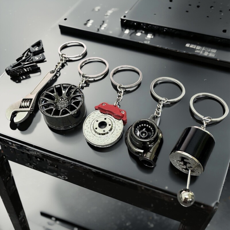 Five-Piece Set of Creative Metal Keychains, Turbo Gear, Wheel Hub, Brake Disc, Shock Absorber, Tools, Car Pendants Wholesale Five-Piece Set of Creative Metal Keychains, Turbo Gear, Wheel Hub, Brake Disc, Shock Absorber, Tools, Car Pendants Wholesale