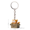 Please take away the red-mouthed yellow cat keychain