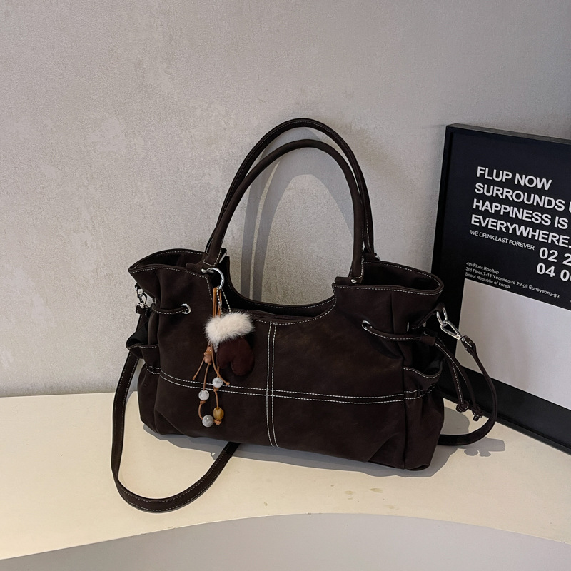 Retro nicho locomotora viento bolso otoño invierno 2025 nuevo sentido de alta calidad de viaje de hombro bajo la braza bolso de mujer