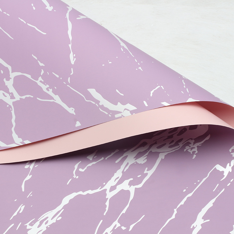 Huaxi Ouya Paper Mármol Papel de embalaje de flores Impresión engrosado Papel de flores impermeable Florería Ramo de flores Embalaje floral