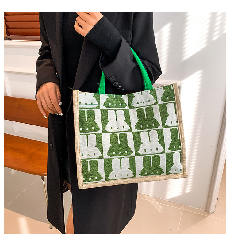 High-end mid-capacity canvas school commuting handbag 2024 new style fashionable and versatile linen single-shoulder tote bag undefined