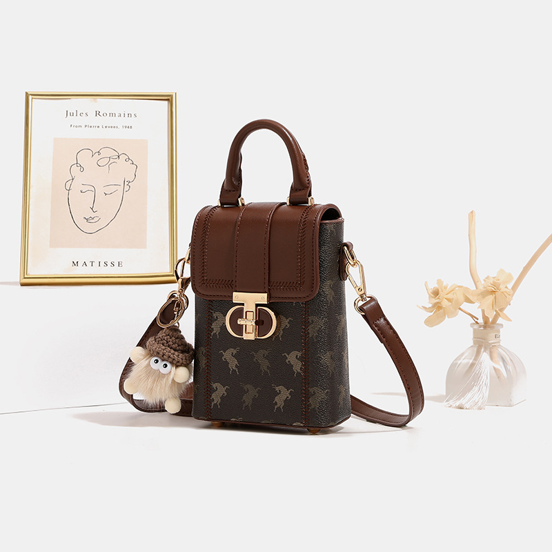 Otoño y invierno mini bolso de mujer 2026 nuevo nicho de hombro pequeño bolso de hombro de alto nivel bolso de mano pequeño bolso de teléfono móvil