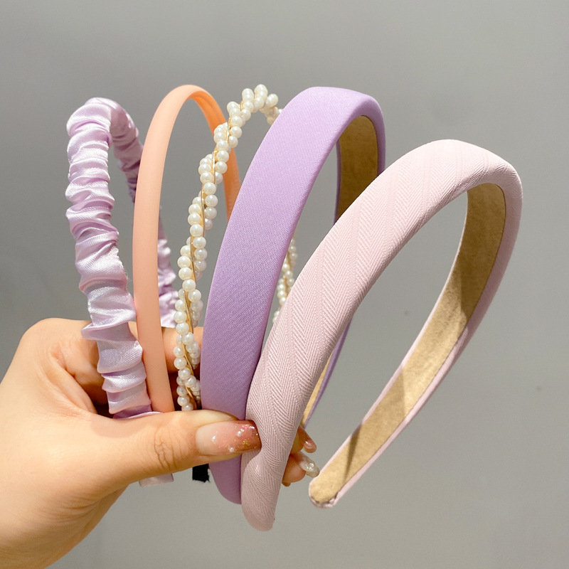 A principios de la primavera, la banda de cabello para mujeres en línea, 2025 nuevo lavado de cara de presión de tarjeta de cabello para el cabello, banda de cabello de perlas, banda de cabello para mujeres.