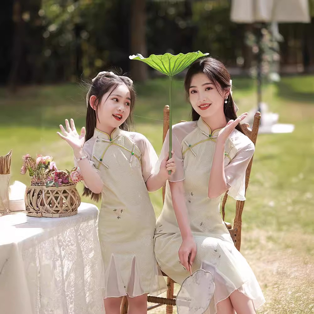 Estrictamente seleccionado 2024 verano nueva ropa transpirable para padres e hijos, gasa de red cheongsam mejorada, ropa de rendimiento de madre e hija de estilo chino, arte