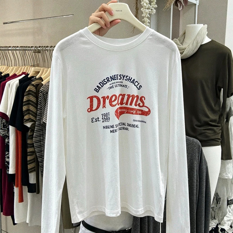 Korean Dongdaemun loose-fit pure cotton long-sleeve T-shirt for women, autumn/winter collection, with letter print and round neckline, Korean-style women's clothing, suitable as a base layer Korean Dongdaemun loose-fit pure cotton long-sleeve T-shirt for women, autumn/winter collection, with letter print and round neckline, Korean-style women's clothing, suitable as a base layer