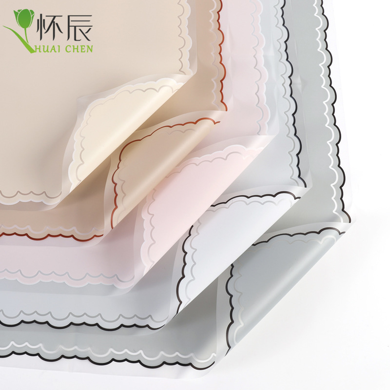 厂家批发新款小手帕果冻膜鲜花包装纸防水雾面纸情人节礼物包花纸