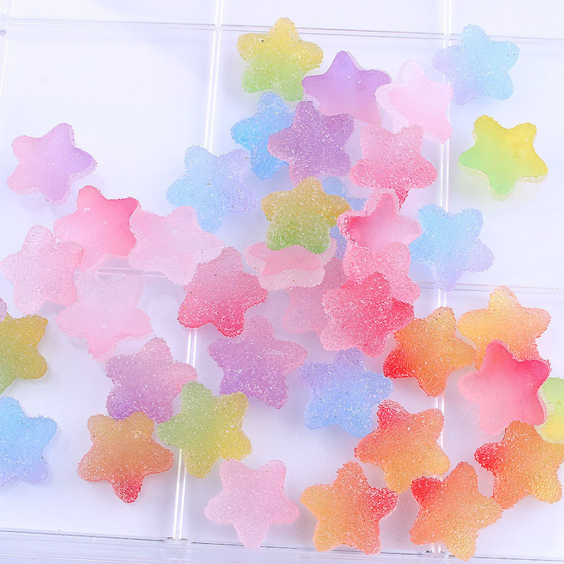 Gradiente de dibujos animados simulación estrella suave caramelo accesorios DIY resina suave pegamento caramelo al por mayor crema pegamento teléfono caso material