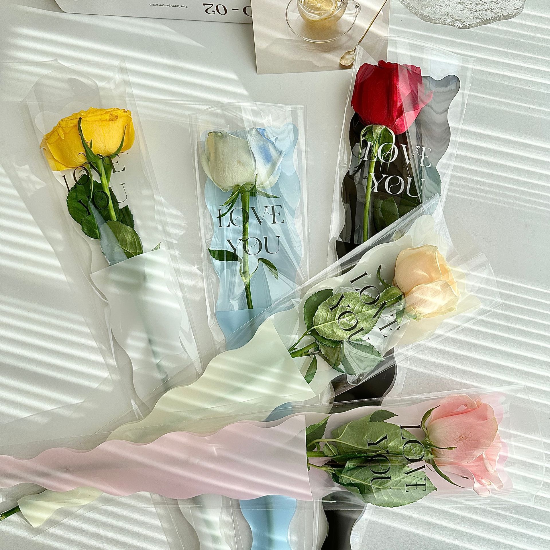 Nueva sirena ondulación del agua sola flor bolsa de embalaje Rosa embalaje OPP escalera bolsa floral material