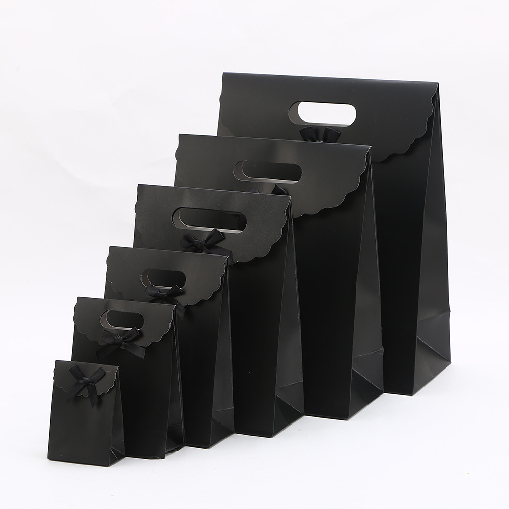 Bolsa de cartón blanco de color sólido Bolsa de regalo de color dopamina Bolsa de embalaje de regalo de gran capacidad LOGO se puede imprimir en bolsas de mano