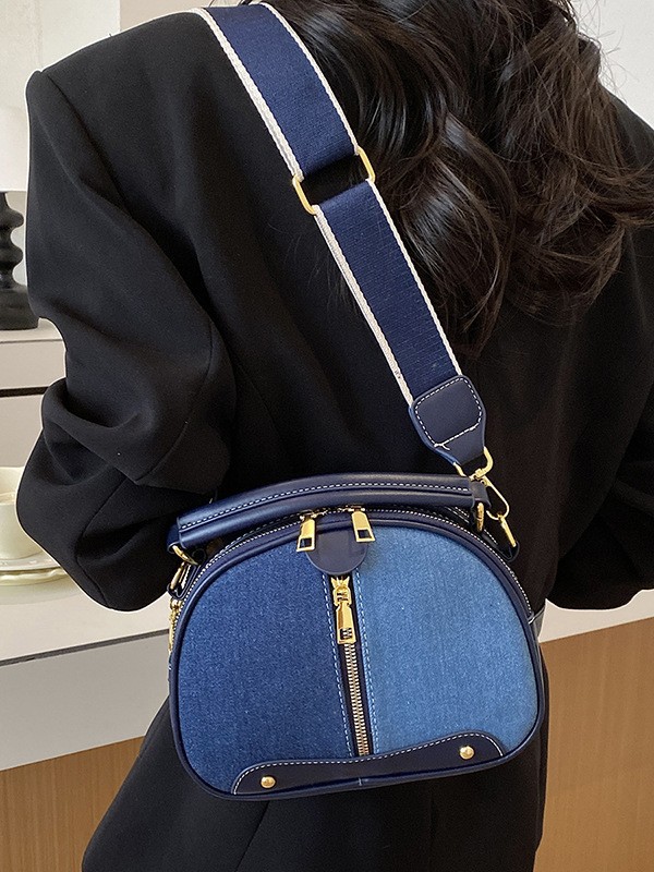 Bolso de mano de nicho coreano para mujeres 2026 comercio exterior nuevo denim empalme de color alto sentido versátil mochila