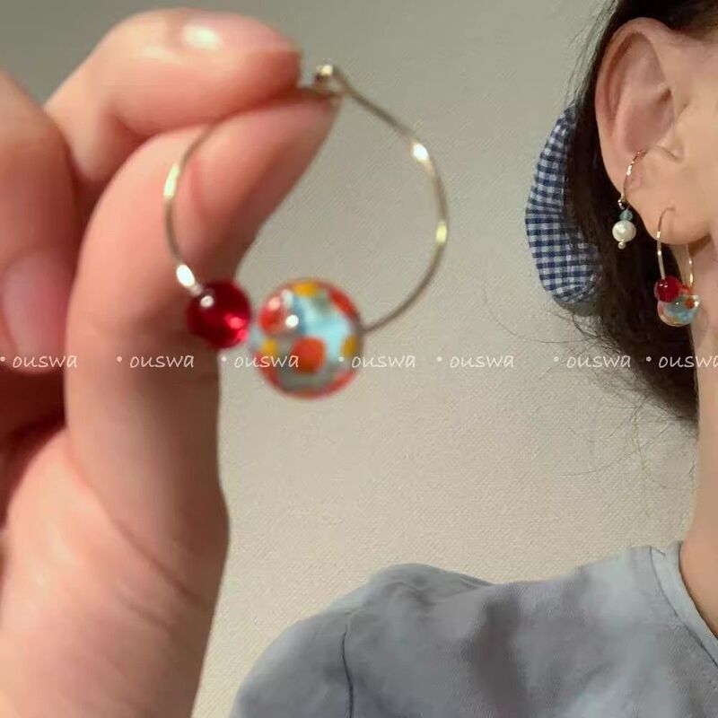 2025 French Simple Dopamine Colored Ball Ear Ring Women's Advanced Personality Niche Elegant White Design Sense Earrings