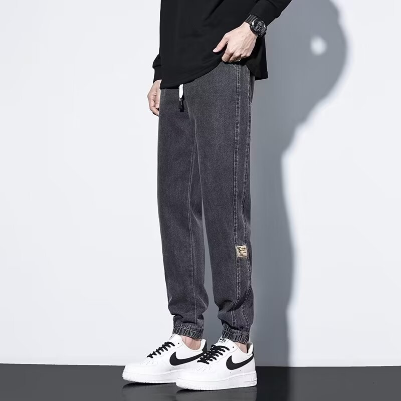 2024 primavera y otoño pantalones vaqueros de cintura elástica todo fósforo para hombres, pantalones de pierna ancha rectos sueltos para adolescentes de la calle principal