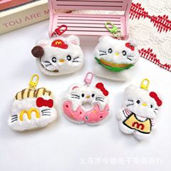 創意的なアニメkt猫のぬいぐるみがハンバーグを飾っています。