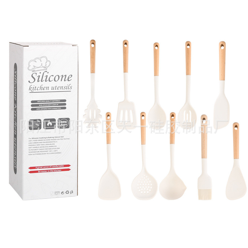 Suministros de cocina Mango de madera de silicona sartén antiadherente europea Espátula de silicona Juego de 10 piezas Juego de utensilios de cocina azul resistente a altas temperaturas