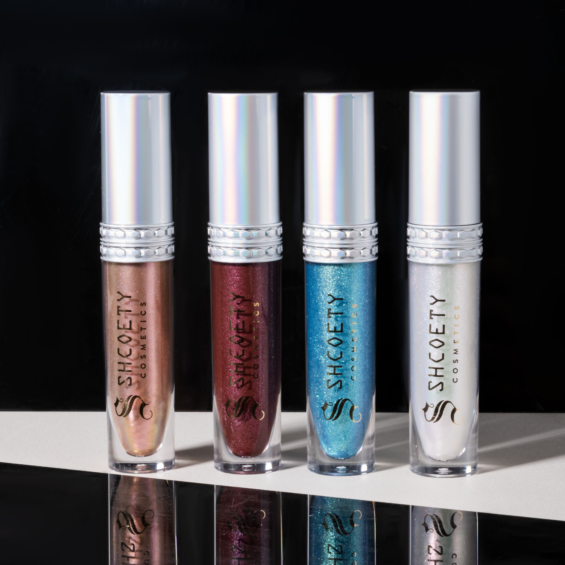 SHCOETY Cross-border Sparkling Polarized Lip Gloss is long-lasting and easy to color, with a dazzling bright lip gloss and a fine pearlescent glow that moisturizes the lips undefined