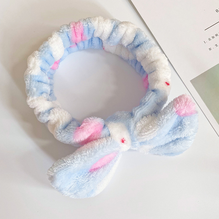 Europa y los Estados Unidos ondulado punto de leopardo coral mariposa fin correa de cabello mujer lavado cara banda de cabello rayas transfronterizas peluche adornamientos para el cabello al por mayor