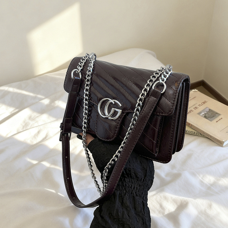 Comercio exterior bolso de explosión simple retro ondulado bolso de amor bolso de hombro para mujeres sensación de diseño de lujo ligero