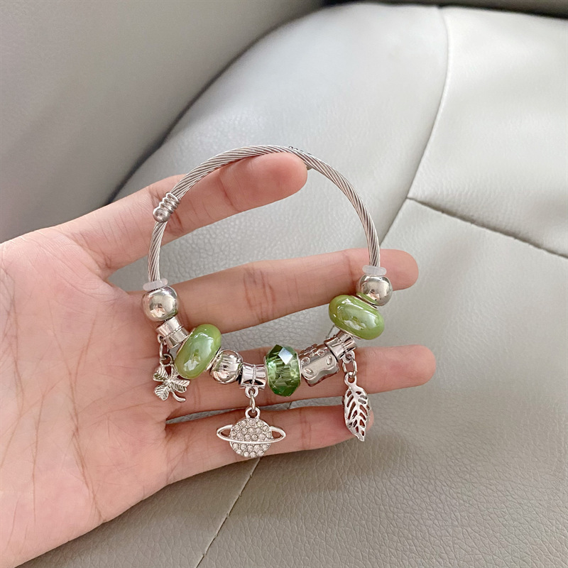 Nicho de la moda versátil pulsera de alto grado de lujo luz diseño personalizado pulsera de Saturno abierto de diamantes incrustado transfronterizo