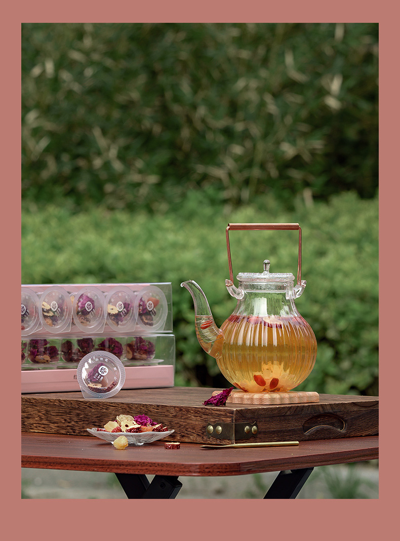 Hong Yan Si Bao Tea 125g Small Canister Floral Herbal Blend Hot Brew Daily Wellness Tea in use