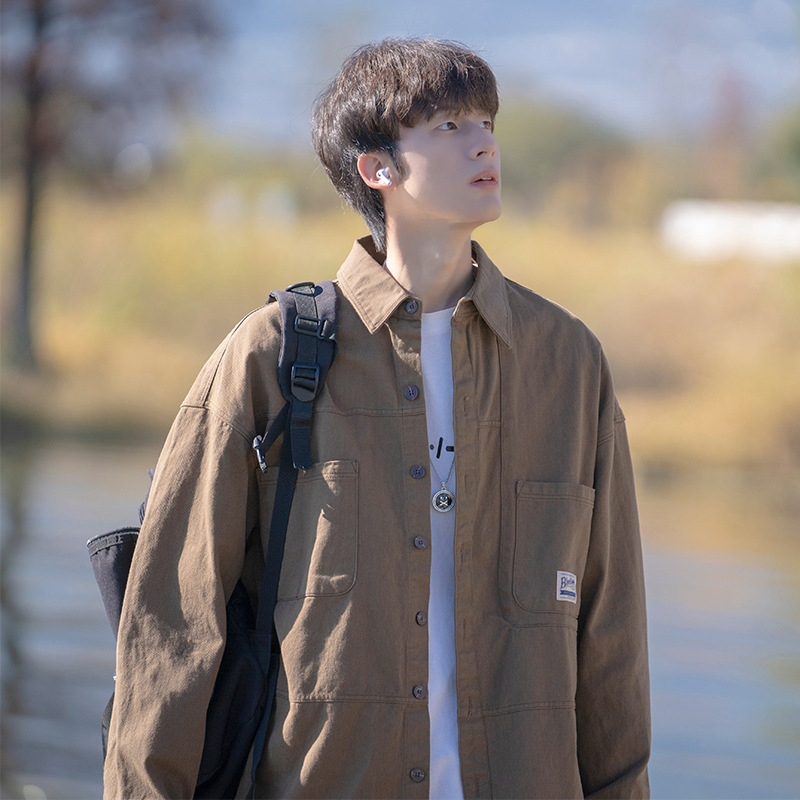 Suministro directo de fábrica camisa de ropa de trabajo de estilo japonés capa de primavera y otoño marca de moda suelta primavera y otoño camisa de manga larga de los hombres