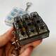 Foreign trade test shaft nine-key key decompression toy key chain pendant fingertip press can add lamp toy fingertip press