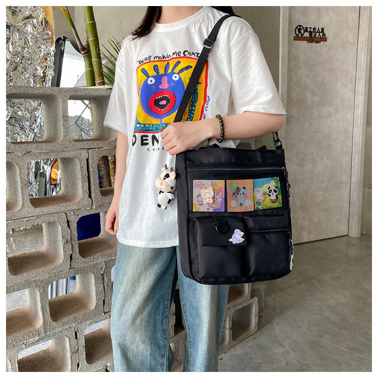 Large-capacity Japanese-style single-shoulder canvas bag for girls, versatile crossbody, ins, a tote bag for junior high school students' classes, and a schoolbag for after-school tutoring undefined