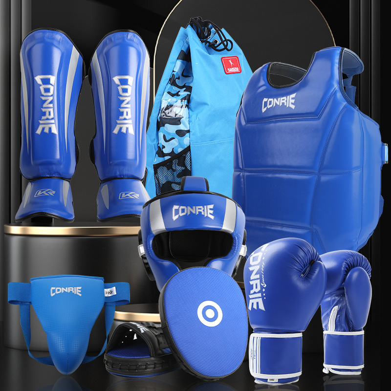 Kangrui nueva Sanda boxeo traje de equipo de protección boxeo para niños Muay Thai protector de la cabeza protector de la entrepierna protector de la pierna