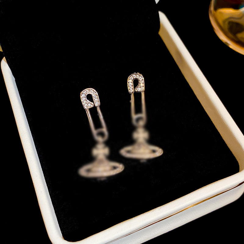 Pendientes de arco estrella japonesa y coreana pendientes de moda para las mujeres Oro real electrochapado aguja de plata circón perla flor