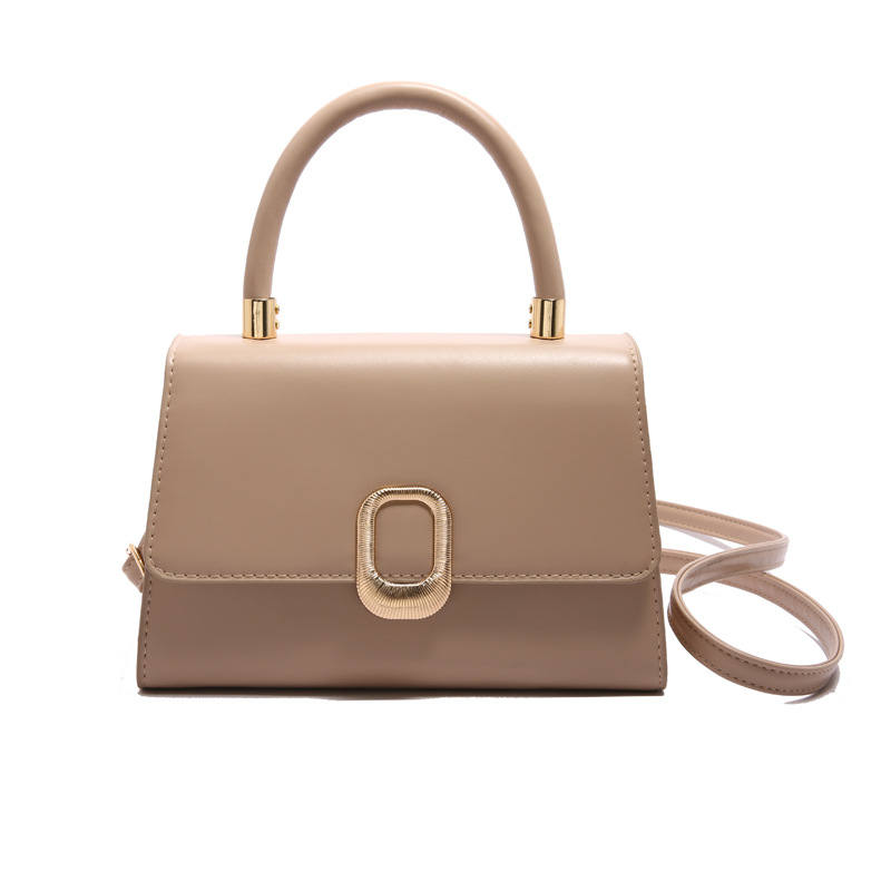 Moda y estilo occidental simple 2025 nuevo bolso de mensajero de un solo hombro de color sólido de moda elegante bolso cuadrado pequeño portátil de viaje de primavera mujer