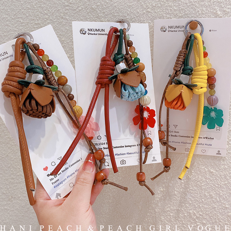 HD9217A04 cadena 05 estrellas otoño y invierno con la misma bola de flores de cuero PU llavero de coche colgante bolso colgante